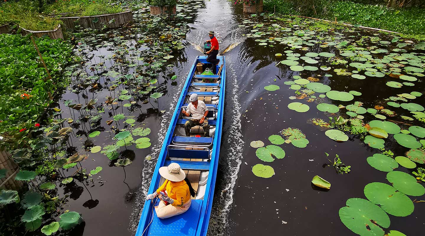 take a boat trip in Mekong Delta