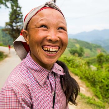 Happy Red Zao woman smiling to the camera